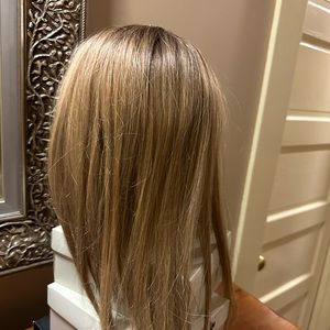 Long synthetic John Renau topper.